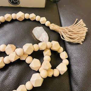 Decor wood beads. One side rock with gold /other side pompon